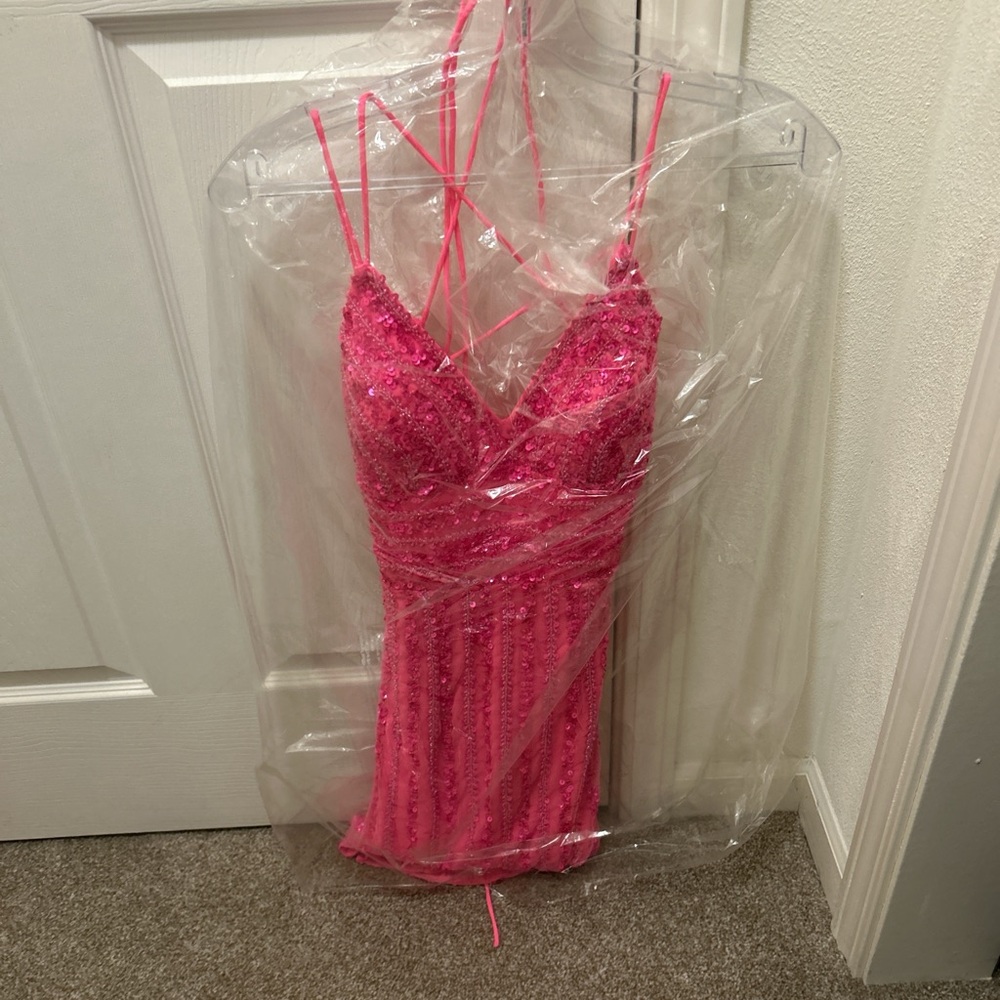 i am selling a pink homecoming dress from Gipper Prom